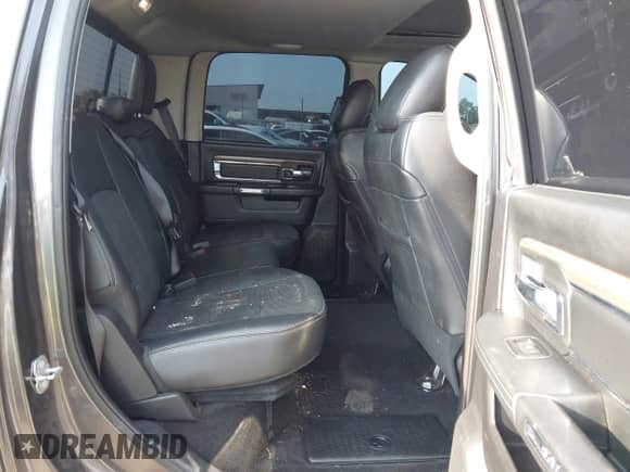 2015 Ram 1500 Laramie z VIN 1C6RR7NT1FS786050, wystawiony jako IAAI lot #42905016 z przebiegiem 154 670 mil mil oraz . Historia ofert i sprzedaży dostępna na DreamBid. Obrazek 8.