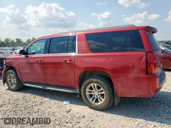 2015 Chevrolet Suburban LT с VIN 1GNSCJKC4FR162156, выставлен на аукционе Copart как лот 67973735 с пробегом 149 122 миль миль и Списание • Salvage title. История ставок и продаж доступна на DreamBid. Изображение 2.