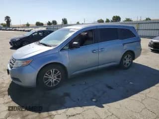 2013 Honda Odyssey EX с VIN 5FNRL5H44DB075651, выставлен на аукционе Copart как лот 64466045 с пробегом 196 033 миль миль и Списание • Salvage title. История ставок и продаж доступна на DreamBid. Изображение 1.