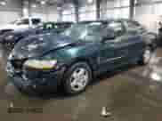 1998 Honda Accord EX with VIN 1HGCG1659WA023184, listed as a Copart auction lot 63247425 with 194,320 mi miles and Salvage title. Bid and sale history available at DreamBid. Image 1.