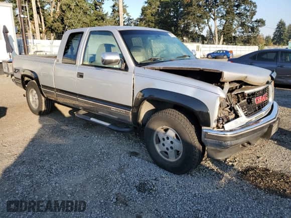 1994 GMC Sierra 1500 с VIN 2GTEK19K4R1589842, выставлен на аукционе Copart как лот 84993185 с пробегом 217 057 миль миль и Списание • Salvage title. История ставок и продаж доступна на DreamBid. Изображение 4.