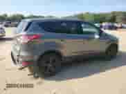 2014 Ford Escape SE with VIN 1FMCU0GX4EUA05458, listed as a Copart auction lot 83795615 with 193,552 mi miles and Salvage title. Bid and sale history available at DreamBid. Image 3.