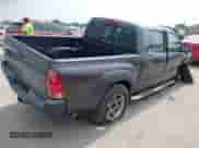 2014 Toyota Tacoma PreRunner z VIN 5TFJX4GN0EX027383, wystawiony jako IAAI lot #42299753 z przebiegiem 194 136 mil mil oraz . Historia ofert i sprzedaży dostępna na DreamBid. Obrazek 4.