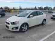 2014 Chevrolet Sonic LTZ with VIN 1G1JE5SH3E4133088, listed as a IAAI auction lot 41072056 with 143,855 mi miles and . Bid and sale history available at DreamBid. Image 2.