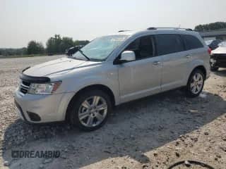 2013 Dodge Journey Crew with VIN 3C4PDDDG9DT635194, listed as a Copart auction lot 67082145 with 186,554 mi miles and Clean title. Bid and sale history available at DreamBid. Image 1.