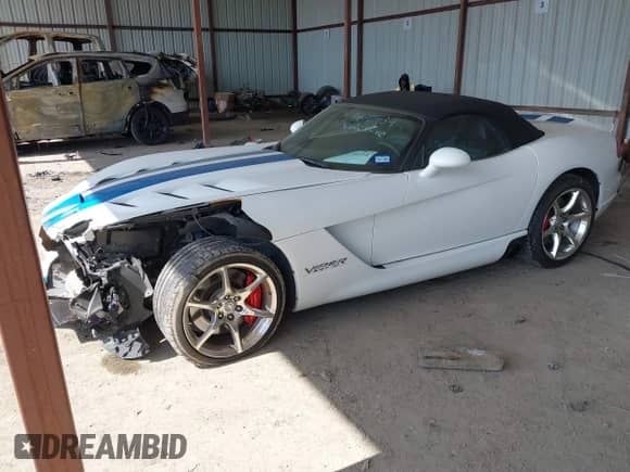 2009 Dodge Viper SRT-10 with VIN 1B3JZ65Z39V500286, listed as a IAAI auction lot 41670434 with 120,854 mi miles and . Bid and sale history available at DreamBid. Image 17.