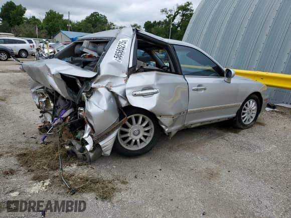2005 Hyundai XG z VIN KMHFU45E15A401774, wystawiony jako Copart lot #58585275 z przebiegiem 184 132 mil mil oraz Szkoda całkowita • Salvage title. Historia ofert i sprzedaży dostępna na DreamBid. Obrazek 3.
