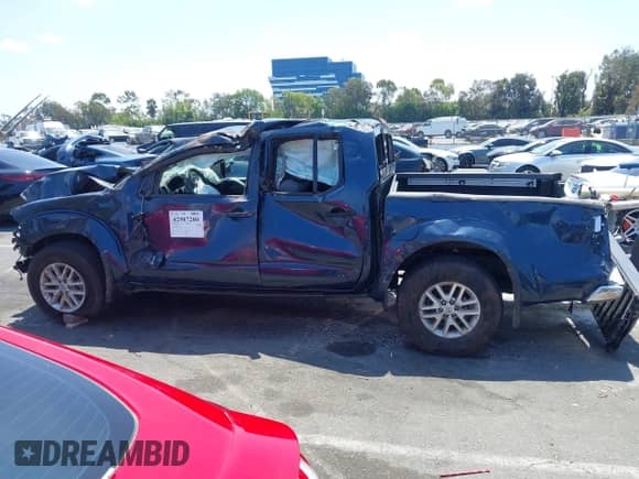 2019 Nissan Frontier SV with VIN 1N6AD0ER1KN876823, listed as a IAAI auction lot 42987280 with Not provided miles and . Bid and sale history available at DreamBid. Image 14.