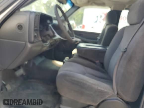 2006 Chevrolet Silverado 1500 LS with VIN 1GCEC19XX6Z276676, listed as a Copart auction lot 69102675 with 266,266 mi miles and Salvage title. Bid and sale history available at DreamBid. Image 7.