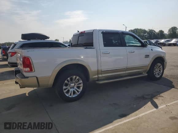 2014 Ram 1500 Longhorn z VIN 1C6RR7PM0ES430516, wystawiony jako Copart lot #67380935 z przebiegiem 129 880 mil mil oraz Czysty tytuł • Clean title. Historia ofert i sprzedaży dostępna na DreamBid. Obrazek 3.