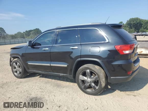 2013 Jeep Grand Cherokee Limited with VIN 1C4RJFBG3DC585890, listed as a Copart auction lot 69133595 with 181,993 mi miles and Clean title. Bid and sale history available at DreamBid. Image 2.