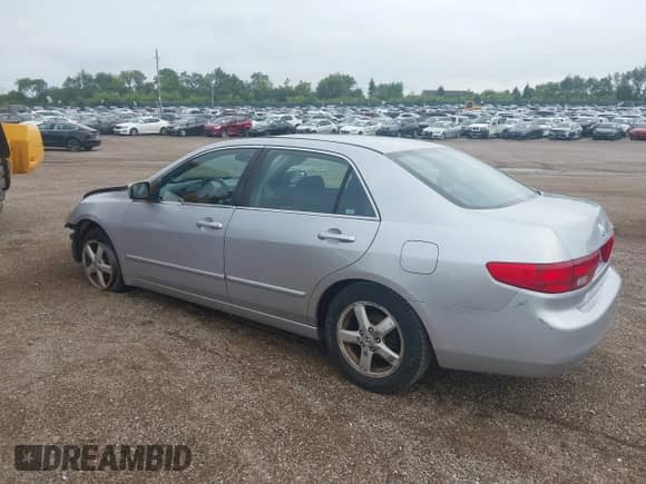 2005 Honda Accord EX with VIN 1HGCM56735A011869, listed as a IAAI auction lot 43001192 with 160,957 mi miles and . Bid and sale history available at DreamBid. Image 3.