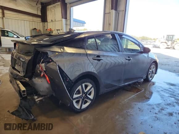 2018 Toyota Prius Two Eco z VIN JTDKARFU8J3065635, wystawiony jako Copart lot #84043455 z przebiegiem 113 173 mil mil oraz Czysty tytuł • Clean title. Historia ofert i sprzedaży dostępna na DreamBid. Obrazek 3.