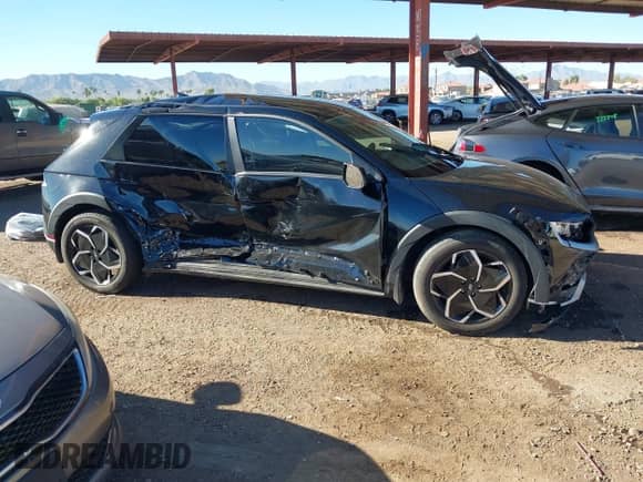 2023 Hyundai Ioniq 5 SE with VIN KM8KM4AE4PU186526, listed as a IAAI auction lot 43348590 with 26,965 mi miles and . Bid and sale history available at DreamBid. Image 13.