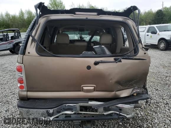 2004 Chevrolet Tahoe LS with VIN 1GNEC13ZX4R152843, listed as a Copart auction lot 51775035 with 294,488 mi miles and Salvage title. Bid and sale history available at DreamBid. Image 6.
