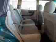 1999 Subaru Forester L with VIN JF1SF6355XG717440, listed as a Copart auction lot 65808265 with 374,544 mi miles and Salvage title. Bid and sale history available at DreamBid. Image 11.