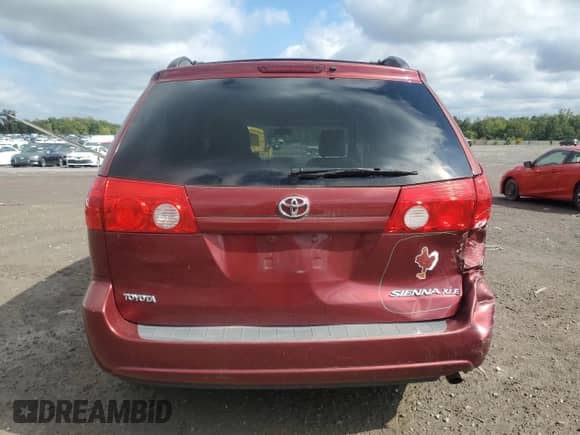 2009 Toyota Sienna XLE с VIN 5TDZK22C39S252050, выставлен на аукционе Copart как лот 81192095 с пробегом 137 814 миль миль и Списание • Salvage title. История ставок и продаж доступна на DreamBid. Изображение 6.