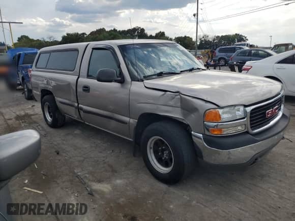 2002 GMC Sierra 1500 SL с VIN 1GTEC14V22Z245177, выставлен на аукционе Copart как лот 70560024 с пробегом 187 881 миль миль и Списание • Salvage title. История ставок и продаж доступна на DreamBid. Изображение 4.