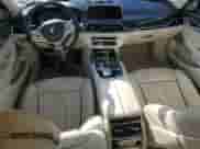 2018 BMW 7 Series 750i with VIN WBA7F0C52JGM24063, listed as a Copart auction lot 61251915 with 89,955 mi miles and Clean title. Bid and sale history available at DreamBid. Image 8.