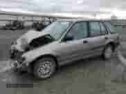 1990 Honda Civic with VIN JHMEE2754LS010638, listed as a Copart auction lot 85169464 with 167,566 mi miles and Salvage title. Bid and sale history available at DreamBid. Image 1.