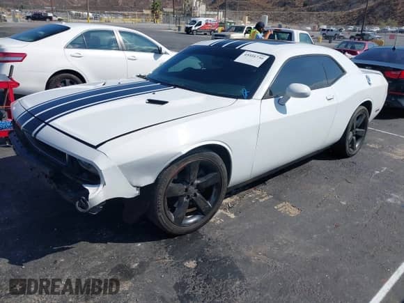 2013 Dodge Challenger SXT с VIN 2C3CDYAG0DH511936, выставлен на аукционе IAAI как лот 43316730 с пробегом 173 412 миль миль и . История ставок и продаж доступна на DreamBid. Изображение 2.