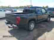 2011 Chevrolet Colorado 1LT z VIN 1GCHTCFE7B8136127, wystawiony jako IAAI lot #43083805 z przebiegiem 130 785 mil mil oraz . Historia ofert i sprzedaży dostępna na DreamBid. Obrazek 4.