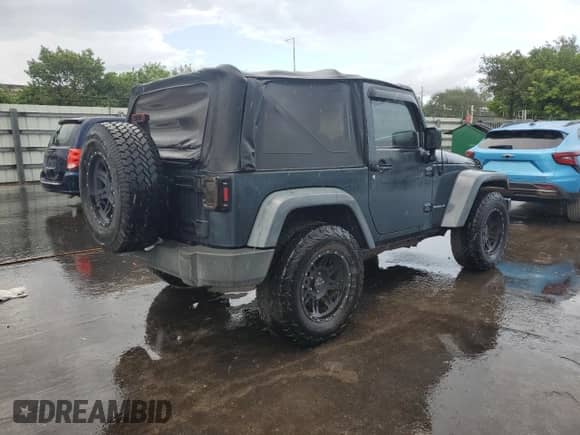 2008 Jeep Wrangler X z VIN 1J4FA241X8L617822, wystawiony jako Copart lot #81800925 z przebiegiem 149 945 mil mil oraz Czysty tytuł • Clean title. Historia ofert i sprzedaży dostępna na DreamBid. Obrazek 3.
