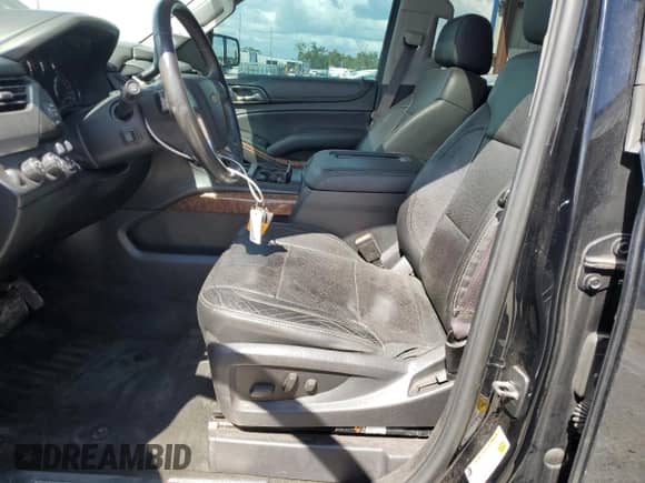 2015 Chevrolet Tahoe LTZ with VIN 1GNSKCKC3FR216657, listed as a Copart auction lot 85706835 with 195,674 mi miles and Salvage title. Bid and sale history available at DreamBid. Image 7.