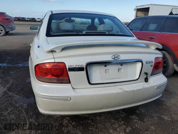 2003 Hyundai Sonata GLS z VIN KMHWF35H83A876608, wystawiony jako Copart lot #78296724 z przebiegiem Nie podano mil oraz Nie do naprawy • Non repairable. Historia ofert i sprzedaży dostępna na DreamBid. Obrazek 6.