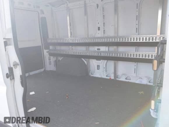 2023 Ram ProMaster Cargo z VIN 3C6LRVVG1PE598744, wystawiony jako IAAI lot #42946879 z przebiegiem Nie podano mil oraz . Historia ofert i sprzedaży dostępna na DreamBid. Obrazek 8.