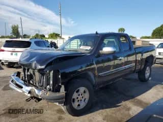 2013 Chevrolet Silverado 1500 LT with VIN 1GCRKSE79DZ150015, listed as a Copart auction lot 71039815 with 150,568 mi miles and Salvage title. Bid and sale history available at DreamBid. Image 1.