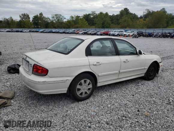 2003 Hyundai Sonata z VIN KMHWF25H03A862518, wystawiony jako Copart lot #82239235 z przebiegiem 196 924 mil mil oraz Szkoda całkowita • Salvage title. Historia ofert i sprzedaży dostępna na DreamBid. Obrazek 3.