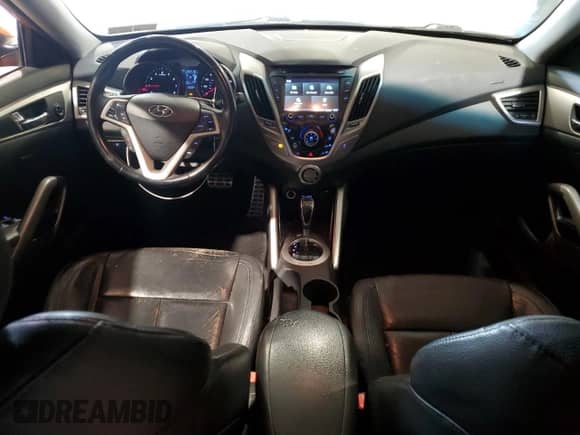 2014 Hyundai Veloster z VIN KMHTC6AD4EU212324, wystawiony jako Copart lot #71514455 z przebiegiem 120 419 mil mil oraz Czysty tytuł • Clean title. Historia ofert i sprzedaży dostępna na DreamBid. Obrazek 8.