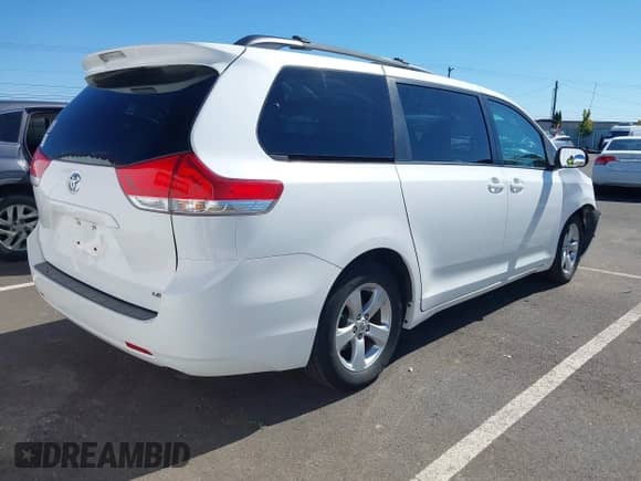 2011 Toyota Sienna LE with VIN 5TDKK3DC5BS156172, listed as a IAAI auction lot 43237005 with 159,013 mi miles and . Bid and sale history available at DreamBid. Image 4.