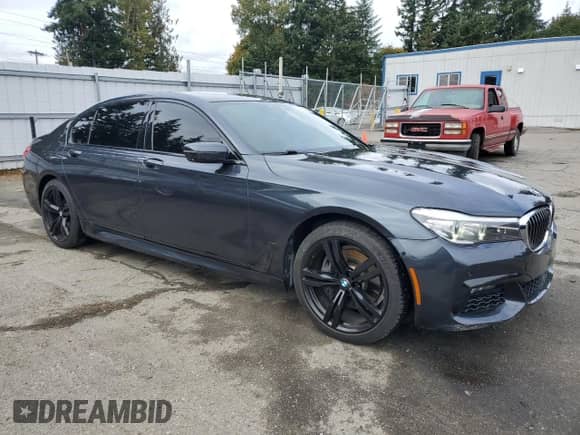 2016 BMW 7 Series 740i z VIN WBA7E2C56GG547680, wystawiony jako Copart lot #86317195 z przebiegiem 85 092 mil mil oraz Szkoda całkowita • Salvage title. Historia ofert i sprzedaży dostępna na DreamBid. Obrazek 4.