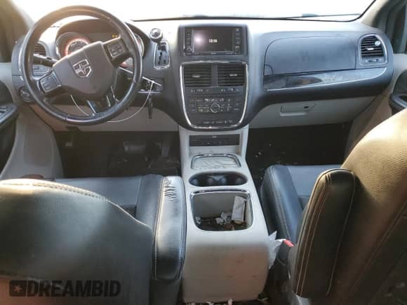 2014 Dodge Grand Caravan SXT 30th Anniversary with VIN 2C4RDGCG2ER462554, listed as a Copart auction lot 86085115 with 101,691 mi miles and Salvage title. Bid and sale history available at DreamBid. Image 8.
