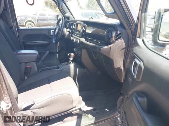 2021 Jeep Wrangler Unlimited Sport S with VIN 1C4HJXDN4MW596523, listed as a IAAI auction lot 43094668 with 128,511 mi miles and . Bid and sale history available at DreamBid. Image 5.