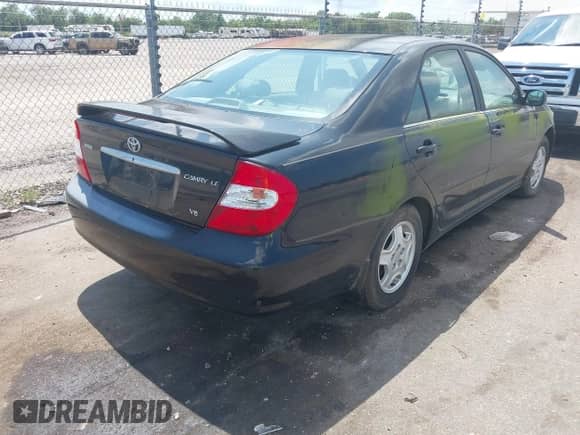 2002 Toyota Camry XLE с VIN 4T1BF32K82U019653, выставлен на аукционе IAAI как лот 43147237 с пробегом 26 002 миль миль и . История ставок и продаж доступна на DreamBid. Изображение 4.