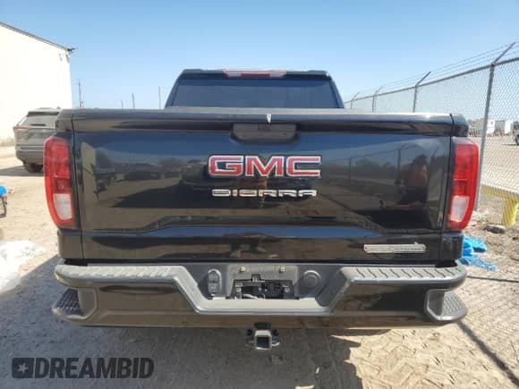 2019 GMC Sierra 1500 Elevation with VIN 1GTR8CEDXKZ423048, listed as a Copart auction lot 76867424 with 84,882 mi miles and Salvage title. Bid and sale history available at DreamBid. Image 6.
