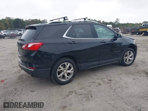 2018 Chevrolet Equinox LT with VIN 2GNAXKEX2J6335603, listed as a IAAI auction lot 43378303 with 172,672 mi miles and . Bid and sale history available at DreamBid. Image 4.