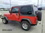 1992 Jeep Wrangler with VIN 2J4FY29S3NJ535736, listed as a Copart auction lot 67747244 with 144,912 mi miles and Salvage title. Bid and sale history available at DreamBid. Image 2.