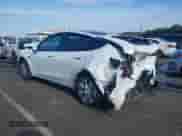 2022 Tesla Model Y Long Range z VIN 7SAYGDEEXNF418006, wystawiony jako IAAI lot #43267037 z przebiegiem 36 028 mil mil oraz . Historia ofert i sprzedaży dostępna na DreamBid. Obrazek 3.