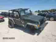 1997 Jeep Wrangler SE с VIN 1J4FY29P3VP508471, выставлен на аукционе Copart как лот 70949895 с пробегом 168 706 миль миль и Списание • Salvage title. История ставок и продаж доступна на DreamBid. Изображение 4.