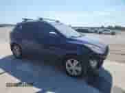 2011 Hyundai Tucson GLS with VIN KM8JU3AC3BU124953, listed as a Copart auction lot 70328355 with 150,166 mi miles and Salvage title. Bid and sale history available at DreamBid. Image 4.