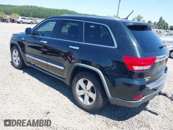 2012 Jeep Grand Cherokee Overland Summit z VIN 1C4RJFCT8CC274935, wystawiony jako IAAI lot #42711029 z przebiegiem 157 680 mil mil oraz . Historia ofert i sprzedaży dostępna na DreamBid. Obrazek 3.