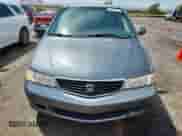 2001 Honda Odyssey EX с VIN 2HKRL18671H543086, выставлен на аукционе Copart как лот 69700575 с пробегом 163 931 миль миль и Списание • Salvage title. История ставок и продаж доступна на DreamBid. Изображение 5.