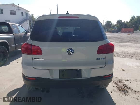 2015 Volkswagen Tiguan S with VIN WVGAV7AXXFW571961, listed as a IAAI auction lot 43537263 with 147,521 mi miles and . Bid and sale history available at DreamBid. Image 16.