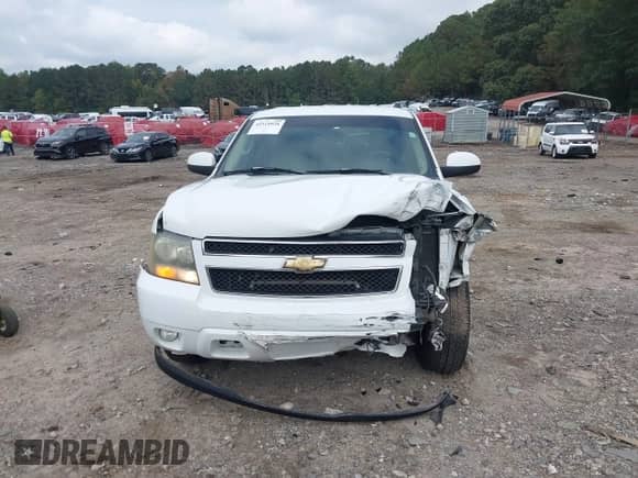 2007 Chevrolet Tahoe LS z VIN 1GNFC13017J290263, wystawiony jako IAAI lot #43319938 z przebiegiem 230 704 mil mil oraz . Historia ofert i sprzedaży dostępna na DreamBid. Obrazek 13.