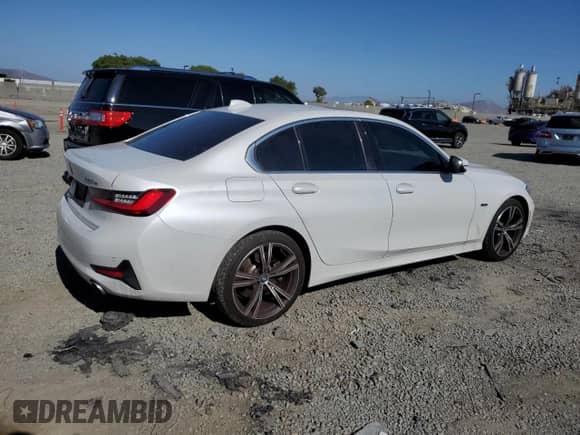 2022 BMW 3 Series 330e with VIN 3MW5P7J03N8C52943, listed as a Copart auction lot 55048115 with 62,561 mi miles and Salvage title. Bid and sale history available at DreamBid. Image 3.
