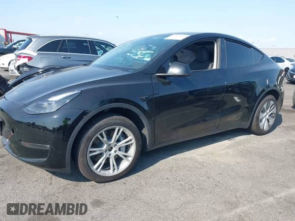 2023 Tesla Model Y Long Range z VIN 7SAYGAEE9PF851348, wystawiony jako IAAI lot #43167064 z przebiegiem Nie podano mil oraz . Historia ofert i sprzedaży dostępna na DreamBid. Obrazek 17.